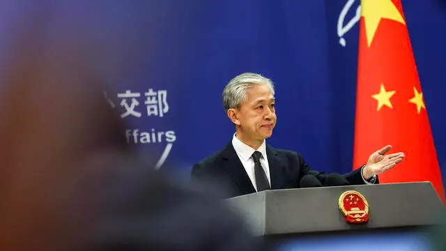 epa11354879 China's Ministry of Foreign Affairs spokesperson, Wang Wenbin, gestures as he holds a press conference in Beijing, China, 20 May 2024. China's Foreign Ministry spokesperson said that President Xi Jinping has sent a message of condolences to Iran's First Vice President Mohammad Mokhber, 'expressing deep condolences on behalf of the Chinese government and people for the death of President Ebrahim Raisi in the helicopter accident'. According to Iranian state media, President Raisi, Foreign Minister Hossein Amir-Abdollahian and several others were killed in a helicopter crash in the mountainous Varzaghan area on 19 May, during their return to Tehran, after an inauguration ceremony of the joint Iran-Azerbaijan constructed Qiz-Qalasi dam at the Aras river. EPA/WU HAO