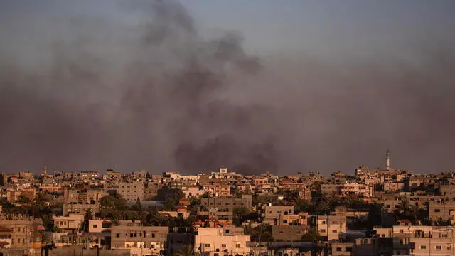 epa11367088 Smoke rises after an Israeli airstrike in Rafah, southern Gaza Strip, 24 May 2024. The International Court of Justice (ICJ) on 24 May ordered Israel to halt its military operation in Rafah, to open the Rafah border crossing with Egypt to allow for the entry of humanitarian aid, to allow access to Gaza for investigators, and to report to the court within one month on its progress. More than 35,000 Palestinians and over 1,400 Israelis have been killed, according to the Palestinian Health Ministry and the Israel Defense Forces (IDF), since Hamas militants launched an attack against Israel from the Gaza Strip on 07 October 2023, and the Israeli operations in Gaza and the West Bank which followed it. EPA/HAITHAM IMAD