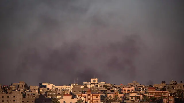 epa11367089 Smoke rises after an Israeli airstrike in Rafah, southern Gaza Strip, 24 May 2024. The International Court of Justice (ICJ) on 24 May ordered Israel to halt its military operation in Rafah, to open the Rafah border crossing with Egypt to allow for the entry of humanitarian aid, to allow access to Gaza for investigators, and to report to the court within one month on its progress. More than 35,000 Palestinians and over 1,400 Israelis have been killed, according to the Palestinian Health Ministry and the Israel Defense Forces (IDF), since Hamas militants launched an attack against Israel from the Gaza Strip on 07 October 2023, and the Israeli operations in Gaza and the West Bank which followed it. EPA/HAITHAM IMAD