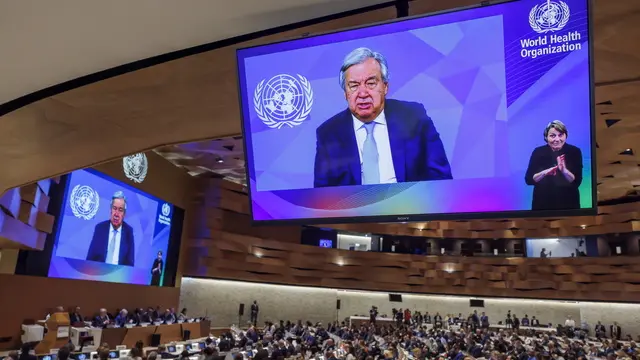 epa11373074 United Nations (UN) Secretary-General Antonio Guterres (on screens) delivers a remote statement, during the opening of the 77th World Health Assembly (WHA77) at the European headquarters of the United Nations in Geneva, Switzerland, 27 May 2024. This year's World Health Assembly is taking place from 27 May through 01 June 2024 and is 'focusing on the resolution on Social participation for universal health coverage, health and well-being and election advocacy', the organization announces on their website. EPA/SALVATORE DI NOLFI