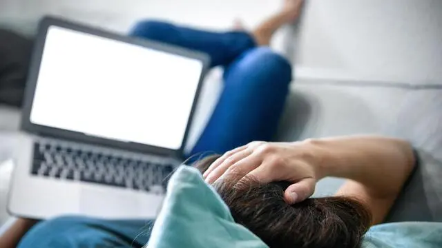 epa07779331 A woman runs a internet connection speed test on her laptop computer in Moenchengladbach, Germany, 18 August 2019. According to a report by Funke Media Group newspapers, only about every third municipality in Germany had gigabit Internet connections last year. EPA/SASCHA STEINBACH