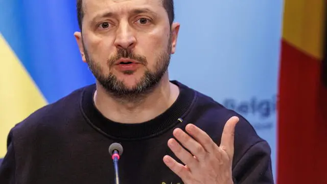 epa11374883 Ukraine's President Volodymyr Zelensky gestures as he addresses the media alongside Belgium's Prime Minister during a surprise visit at the Prime Minister's office in Brussels, Belgium, 28 May 2024. Zelensky visits Belgium to ink the latest in a string of security accords with Western allies. The two leaders will discuss, among other things, Belgium's military support to Ukraine and the signing of a bilateral security agreement, including the supply of F-16 fighter jets as part of the security agreement. EPA/OLIVIER MATTHYS