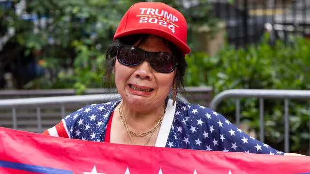 epa11378022 A supporter of former US President Donald Trump cries while gathered in a park across the street from the courthouse as a jury deliberates a verdict in Trumpâ€™s criminal trial at New York State Supreme Court in New York, New York, USA, 21 May 2024. Trump is facing 34 felony counts of falsifying business records related to payments made to adult film star Stormy Daniels during his 2016 presidential campaign. EPA/JUSTIN LANE