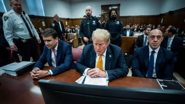 epa11377496 Former President Donald Trump, flanked by attorneys Todd Blanche and Emil Bove, arrives for his criminal trial at the Manhattan Criminal Court in New York, NY, USA, 29 May 2024. Trump was charged with 34 counts of falsifying business records last year, which prosecutors say was an effort to hide a potential sex scandal, both before and after the 2016 presidential election. Trump is the first former U.S. president to face trial on criminal charges. EPA/JABIN BOTSFORD / POOL