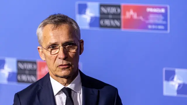 epa11380962 NATO Secretary General Jens Stoltenberg talks to journalist as he arrives for the informal NATO Foreign Ministers Meeting at Czernin Palace, in Prague, Czech Republic, 31 May 2024. The main topic of the two-day informal meeting of NATO foreign ministers is the search for consensus on the Alliance's next steps in support of Ukraine and discuss priorities for the upcoming NATO Washington Summit. EPA/MARTIN DIVISEK