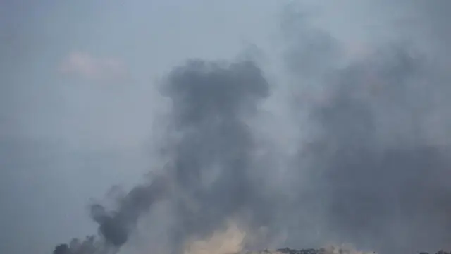 epa11374705 Smoke rises following an Israeli airstrike on the Gaza Strip, as seen from an undisclosed location in southern Israel, 28 May 2024. More than 36,000 Palestinians and over 1,400 Israelis have been killed, according to the Palestinian Health Ministry and the Israel Defense Forces (IDF), since Hamas militants launched an attack against Israel from the Gaza Strip on 07 October 2023, and the Israeli operations in Gaza and the West Bank which followed it. EPA/ATEF SAFADI