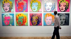 Alcuni ritratti di Marilyn Monroe realizzati da Warhol - Foto Ansa/Epa/Andy Rain © www.giornaledibrescia.it