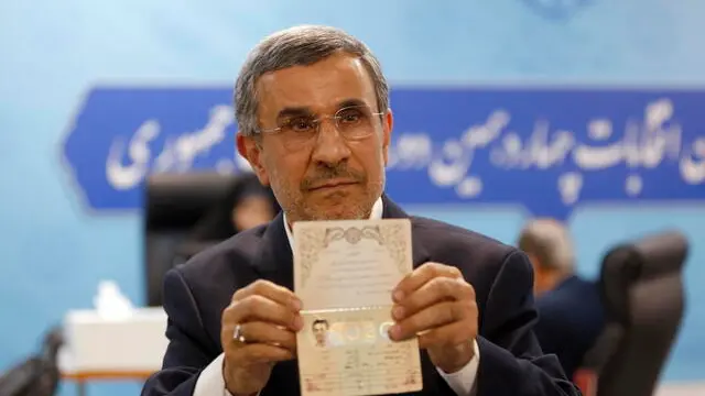 epa11385103 Former Iranian president Mahmoud Ahmadinejad arrives to register his candidacy during the registration for the Iranian presidential election at the Interior Ministry in Tehran, Iran, 02 June 2024. Iran will hold presidential election on 28 June 2024. EPA/ABEDIN TAHERKENAREH