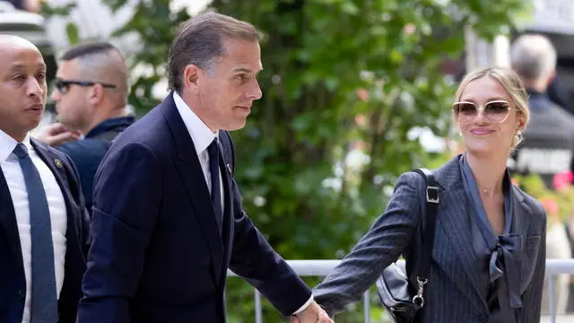 epa11387277 Hunter Biden (L), son of US President Joe Biden, and his wife Melissa Cohen Biden (R) arrive for jury selection on the first day of his federal gun trial, at the US Federal District Court in Wilmington, Delaware, USA, 03 June 2024. Hunter Biden is the first child of a sitting president to appear in court facing criminal charges. EPA/MICHAEL REYNOLDS