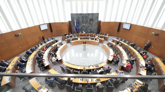 epa11390177 A handout photo made available by Slovenia's National Assembly shows shows Slovenia's Prime Minister Robert Golob addressing the members of the assembly in Ljubljana, Slovenia, 04 June 2024. Slovenia's National Assembly approved the government's proposal for Slovenia to recognize Palestine as an independent state, despite obstruction from the opposition and warnings that it was a violation of the rules of procedure. Slovenia's Parliament vote came after Spain, Norway and Ireland officially recognized a Palestinian state. EPA/MATIJA SUSNIK HANDOUT HANDOUT EDITORIAL USE ONLY/NO SALES HANDOUT EDITORIAL USE ONLY/NO SALES