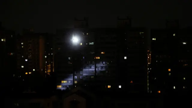 epa11384746 A ray of light from a flashlight is seen on a building's wall in a residential area during an electricity blackout in Kyiv, Ukraine, 01 June 2024, amid the ongoing Russian invasion. Ukraine started cutting electricity following Russian rocket and drone shelling of critical infrastructure in several areas of Ukraine the previous night. Russian troops entered Ukrainian territory on 24 February 2022, starting a conflict that has provoked destruction and a humanitarian crisis. EPA/SERGEY DOLZHENKO