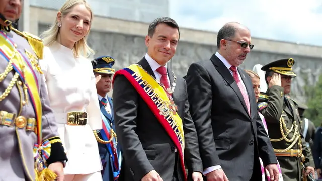 epa11367262 Ecuadorian President Daniel Noboa (C), accompanied by his wife, Lavinia Valbonesi (2-L) and the National Assembly President Henry Kronfle (2-R), leaves after presenting his first report to the nation, in Quito, Ecuador, 24 May 2024. In his speech before the National Assembly, after having served six months in office, Noboa admitted that his government had to make 'hard and profound decisions that no one had risked taking before but that were necessary to guide the country towards a new Ecuador.' EPA/JOSE JACOME