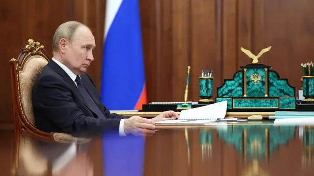 epa11381950 Russian President Vladimir Putin meets with Presidential Commissioner for Children's Rights Maria Lvova-Belova (unseen) at the Kremlin in Moscow, Russia, 31 May 2024. EPA/ALEXANDER KAZAKOV/SPUTNIK/KREMLIN POOL MANDATORY CREDIT