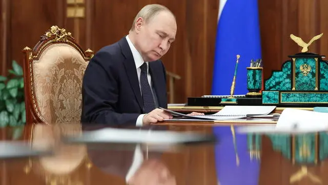 epa11381949 Russian President Vladimir Putin meets with Presidential Commissioner for Children's Rights Maria Lvova-Belova (unseen) at the Kremlin in Moscow, Russia, 31 May 2024. EPA/ALEXANDER KAZAKOV/SPUTNIK/KREMLIN POOL MANDATORY CREDIT