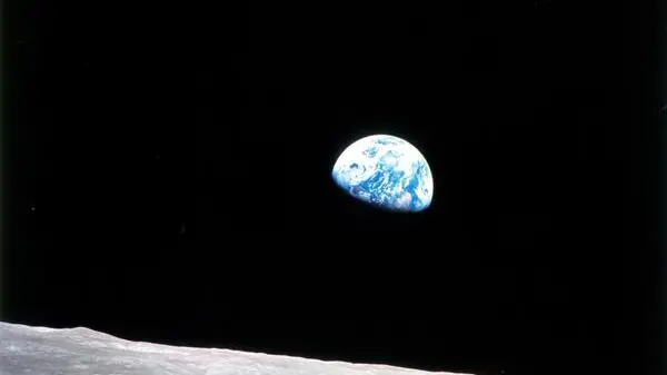 epa07243912 A handout photo made available by the NASA shows the earth as pictured from Apollo 8, the first manned mission to the moon, taken in lunar orbit on 24 December 1968 (issued 21 December 2018). 24 December 2018 marks 50 years since the iconic Earthrise photograph was taken. EPA/Bill Anders/NASA / HANDOUT HANDOUT EDITORIAL USE ONLY/NO SALES