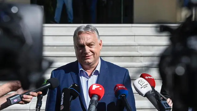 epa11398961 Hungarian Prime Minister Viktor Orban, leader of the ruling Fidesz party, speaks to the media after casting his vote at a polling station during the European Parliament and the local elections in Budapest, Hungary, 09 June 2024. The European Parliament elections take place across EU member states from 06 to 09 June 2024. EPA/Szilard Koszticsak HUNGARY OUT