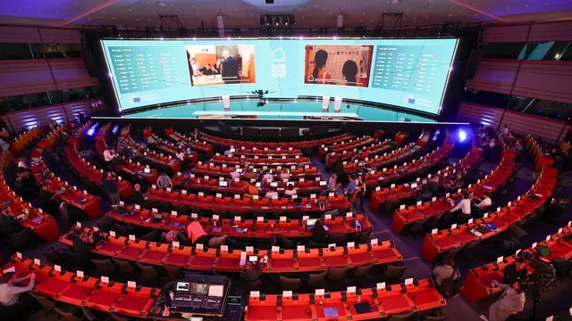 epa11400017 European Parliament Hemicycle with a giant TV Studio from where the broadcast of the results of the European Elections will be aired prior to the European election electoral evening in Brussels, Belgium, 09 June 2024. The European Parliament elections take place across EU member states from 06 to 09 June 2024. Members of the European Parliament met for the last time of the legislature in plenary session in Strasbourg on 25 April 2024. EPA/OLIVIER HOSLET