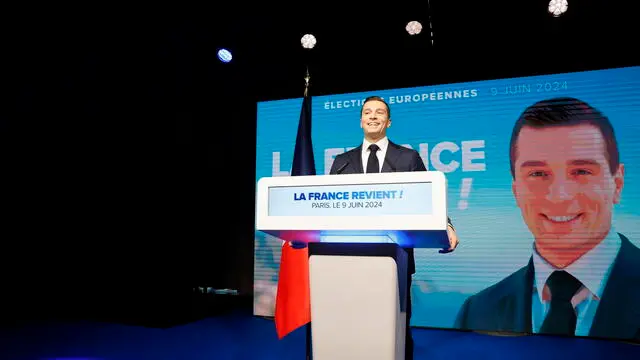 epa11400534 National Rally leader Jordan Bardella delivers a speech at the electoral party of the French right-wing party National Rally (Rassemblement National or RN) in Paris, France, 09 June 2024, after the first results of the European elections. The list of the Rassemblement National, led by party chief Jordan Bardella, is given winner in France according to first estimations after polls. EPA/ANDRE PAIN