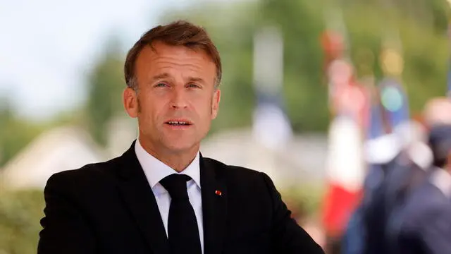 epa11402268 French President Emmanuel Macron speaks during a ceremony marking the 80th anniversary of the massacre of 643 persons by Nazi German forces, in Oradour-sur-Glane, southwestern France, 10 June 2024. On 10 June 1944, just four days after the Allied forces landed on the Normandy coast on D-Day, 643 inhabitants, including 247 children, were massacred in the village of Oradour-sur-Glane in southwestern France, by German Waffen-SS soldiers belonging to the 2nd SS Panzer Division 'Das Reich'. EPA/LUDOVIC MARIN / POOL MAXPPP OUT