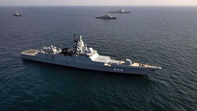 epa10528053 A handout photo made available by Iranian Army shows Admiral Gorshkov class frigate of the Russian Navy Admiral Flota Sovetskogo Soyuza Gorshkov (front) during a joint military drill of Iranian, Russian and Chinese warships in the Gulf of Oman, south of Iran, 17 March 2023. Iran, China and Russia started a joint naval military drills in the Gulf of Oman on 17 March 2023 for two days, according to the Iranian Army. EPA/IRANIAN ARMY HANDOUT HANDOUT EDITORIAL USE ONLY/NO SALES