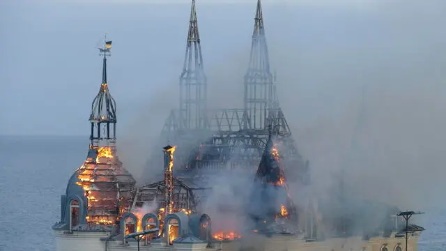 epa11309081 Smoke and flames rise from a damaged private building following a missile strike in Odesa, Ukraine, 29 April 2024. The Head of the Odesa Regional State Administration Oleh Kiper confirmed that at least four people were killed in the missile strike, while more than 30 others were injured, with 25 hospitalized and six in critical conditions. Among the injured were children and a pregnant woman. EPA/IGOR TKACHENKO