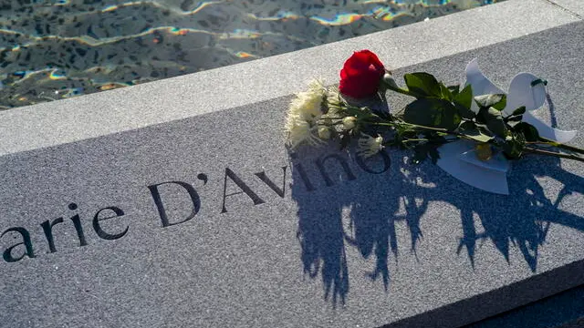 epa10366323 Flowers left on the granite at the name of one of the victims at the Sandy Hook Permanent Memorial site in Newtown, Connecticut, USA, 14 December 2022. This is the tenth anniversary of the school shooting at the Sandy Hook Elementary School that took the lives of 20 school children and six adults and US President Joe Biden declared today a Day of Remembrance. EPA/CJ GUNTHER