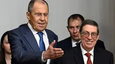 epa11405367 Russian Foreign Minister Sergei Lavrov (L) and his Cuban counterpart Bruno Rodriguez Parrilla (R) enter a hall during their meeting in Moscow, Russia, 12 June 2024. EPA/NATALIA KOLESNIKOVA / POOL