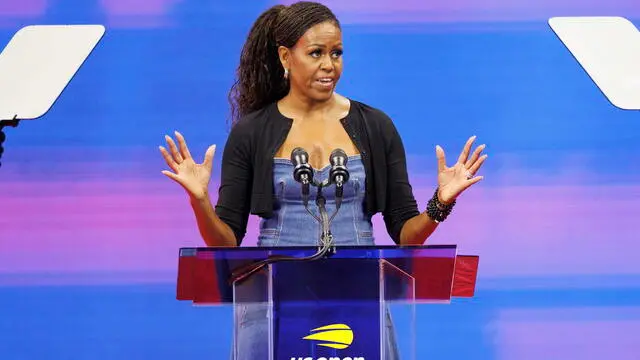 epa10826200 Former US First Lady Michelle Obama addresses the audience during a celebration of 50 Years of Equal Pay at the US Open Tennis Championships at the USTA National Tennis Center in Flushing Meadows, New York, USA, 28 August 2023. The US Open runs from 28 August through 10 September. EPA/CJ GUNTHER