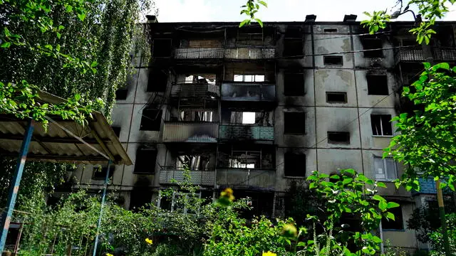 epa10722889 A damaged residential building in Shebekino, Belgorod region, Russia, 02 July 2023. According to local authorities, an average of 500 ammunition per day has fallen on the Belgorod region in recent weeks, prompting Governor Vyacheslav Gladkov to evacuate the inhabitants of Shebekino, as well as nearby villages. However, the number of shells decreased in the last three days recording no more than 30. More than 50 percent of large and medium-sized enterprises in the Shebekinsky urban district of the Belgorod region returned to work after attacks by the Armed Forces of Ukraine, Gladkov said on his VKontakte page. He also said that the Shebekino municipal services restored 65 apartment buildings and 62 private households after shelling. EPA/STRINGER