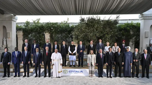 Family photo of G7 leaders with Pope Francis and other Heads of State and Government and international organizations outreach during the G7 Summit in Borgo Egnazia in Brindisi, southern Italy, First line up ( L-R) OECD Secretary-General Mathias Cormann, African Development Bank (AFDB) President Akinwumi Adesina, European Council President Charles Michel, British Prime Minister Rishi Sunak, Japan’s Prime Minister Fumio Kishida, Indian Prime Minister Narendra Modi, German Chancellor Olaf Scholz, Tunisian President Kais Saied, European Commission President Ursula von der Leyen, Managing Director of the International Monetary Fund Kristalina Georgieva and World Bank President Ajay Banga. Second line (L-R) Argentine President Javier Milei, Kenyan Presidnent William Ruto, US President Joe Biden, Mauritania President Mohamed Ould Ghazouani, Turkish President Recep Tayyip Erdogan, Pope Francis, Italian Prime Minister Giorgia Meloni, King Abdallah II of Jordan, French President Emmanuel Macron, Algerian President Abdelmadjid Tebboune, United Arab Emirates President Sheikh Mohammed bin Zayed Al Nahyan, Brazil’s president Luis Ignacio Lula da Silva and United Nations Secretary-General Antonio Guterres June 14, 2024 ANSA / CIRO FUSCO