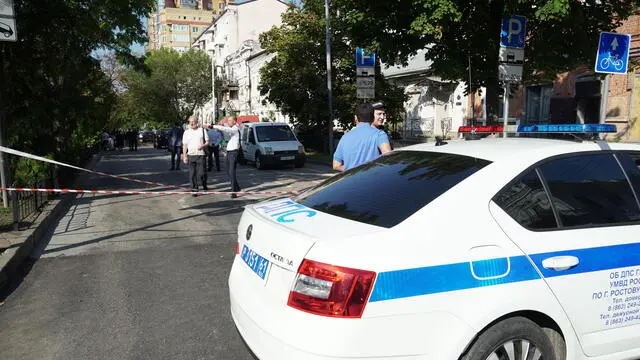epa10845617 Russian policemen block a street following a drone attack in downtown Rostov-on-Don, Russia, 07 September 2023. Russian Air defense systems shot down one drone on approach to Rostov-on-Don, and the second in the city center, said the governor of the Golubev region. On Pushkinskaya Street, the facades of several buildings were damaged, the windows of three buildings were shattered, and several cars were damaged. Traffic in the area of the incident was limited. As a result of damage to an electrical panel in the area of the incident, 20 houses remain without electricity. EPA/STRINGER