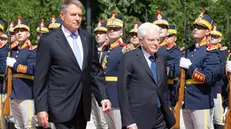 epa11421813 A handout photo made available by the Quirinal Presidential Palace press office shows Romanian President Klaus Iohannis (L front) welcoming Italian President Sergio Mattarella (C) during an official ceremony in Bucharest, Romania, 19 June 2024. Mattarella arrived in Bucharest following his two-day visit to Moldova earlier this week. EPA/Francesco Ammendola/QUIRINALE HANDOUT HANDOUT EDITORIAL USE ONLY/NO SALES HANDOUT EDITORIAL USE ONLY/NO SALES