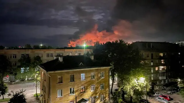 epa10827977 A handout photo made available by the Governor of Russian Pskov region Mikhail Vedernikov Telegram channel shows smoke billowing and explosions light after Russian militaries destroyed drones in Pskov, Pskov region, Russia, 30 August 2023. The Pskov airport was attacked by drones, the governor of the region Mikhail Vedernikov said. Four Il-76 aircraft were damaged. EPA/GOVERNOR OF PSKOV REGION/HANDOUT -- BEST QUALITY AVAILABLE -- HANDOUT EDITORIAL USE ONLY/NO SALES