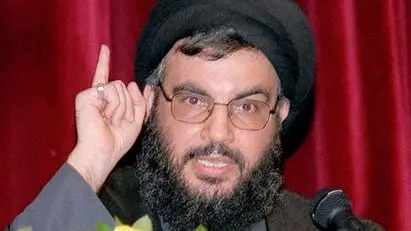 BEI01 - 20010710 - BEIRUT, LEBANON : Hezbollah chief Sheikh Hasan Nasrallah gestures during a speech at the opening of Hezbollah summer activities Tusday10 July 2001 in Haret Hreik, a suburb of Beirut. Israeli Defence Minister Binyamin Ben Eliezer accused the United Nations of bowing to the Lebanese guerrilla movement in an increasingly bitter feud over a UN videotape filmed after the abduction of three Israeli soldiers by Hezbollah in October. EPA PHOTO AFP/ANWAR AMRO
