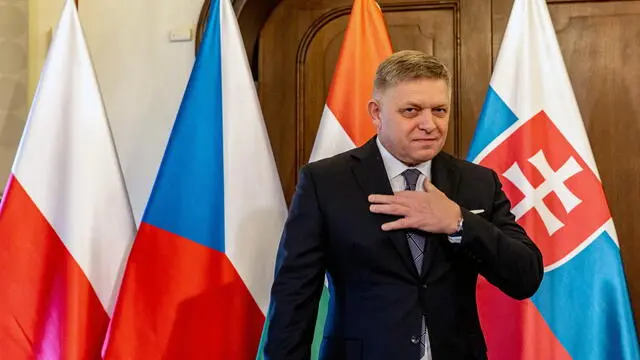 epa11184036 Slovak Prime Minister Robert Fico prepares for a family photo during the meeting of the Visegrad Group (V4) Prime Ministers in Prague, Czech Republic, 27 February 2023. EPA/MARTIN DIVISEK