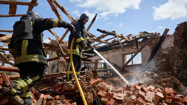 epaselect epa11379750 Ukrainian rescuers work at a site of a rocket hit to the riding hall of the Equestrian Center of the Veterinary Academy in Mala Danylivka village near Kharkiv, Ukraine, 30 May 2024 amid the Russian invasion. The Kharkiv Veterinary Academy was founded in 1804 and its Equestrian Center is a historical building. Nobody was killed or injured during the attack according to the report of the head of the Kharkiv Military Administration Oleg Synegubov. Russian troops entered Ukrainian territory on 24 February 2022, starting a conflict that has provoked destruction and a humanitarian crisis. EPA/SERGEY KOZLOV