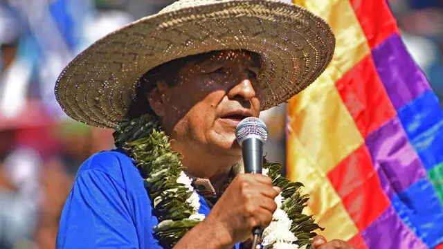 epa11402634 Former president of Bolivia Evo Morales speaks during an event to proclaim his candidacy for the 2025 presidential elections, in Villa Tunari, Bolivia, 10 June 2024. The former president of Bolivia Evo Morales (2006-2019) insisted before thousands of his followers that he is qualified to be a candidate in the 2025 presidential elections and demanded that the Luis Arce government promulgate the law to cease the functions of the magistrates of Bolivia. highest courts of the country. EPA/Jorge Abrego