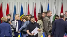 epaselect epa11415643 President Volodymyr Zelensky of Ukraine (C) holds sheets of paper at the plenary session of the Summit on Peace in Ukraine in Stansstad near Lucerne, Switzerland, 16 June 2024. International heads of state gathered on 15 and 16 June at the Buergenstock Resort in central Switzerland for the two-day Summit on Peace in Ukraine. EPA/URS FLUEELER / POOL EDITORIAL USE ONLY EDITORIAL USE ONLY