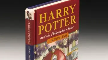 epa03711311 An undated handout image provided by Sotheby's auction house in London, Britain, on 22 May 2013 shows an annotated first edition of 'Harry Potter and the Philosopher Stone' (Bloomsbury, 1997) by British author J.K Rowling. The manuscript, sketched and annotated by the author herself, was sold on 21 May 2013 for 150,000 pounds (177,450 euros), reaching a record price for any J.K. Rowling printed book so far. EPA/SOTHEBY'S HANDOUT EDITORIAL USE ONLY/NO SALES/NO ARCHIVES