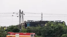 epa11442040 The scene in the aftermath of a train crash in the city of Nove Zamky, Slovakia, 27 June 2024. The accident happened at a railway crossing near the town of Nove Zamky in Southern Slovakia. Five ambulances and two helicopters have been despatched to the accident site. An express train carrying more than 100 passengers from Budapest to Prague crashed into a bus shortly after 5 p.m. local time, killing at least five people and injuring several others. EPA/JAKUB GAVLAK