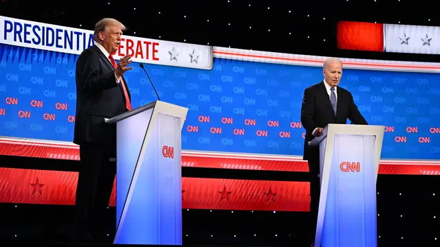 epa11442528 US President Joe Biden (R) and former US President Donald J. Trump (L) participate in the first 2024 presidential election debate, at Georgia Institute of Technologyâ€™s McCamish Pavilion in Atlanta, Georgia, USA, 27 June 2024. The first 2024 presidential election debate is hosted by CNN. EPA/WILL LANZONI / CNN PHOTOS MANDATORY CREDIT: CNN PHOTOS / CREDIT CNN - WILL LANZONI EDITORIAL USE ONLY EDITORIAL USE ONLY