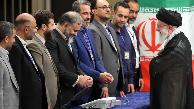 epa11442668 Iranian Supreme Leader Ayatollah Ali Khamenei (R) arrives to cast his vote during the presidential election in Tehran, Iran, 28 June 2024. Iran holds presidential elections on 28 June, following the death of late Iranian President Ebrahim Raisi in a helicopter crash on 19 May 2024. EPA/STR