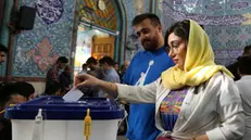 epa11443300 Iranians cast their votes in a polling station during the presidential election, in Tehran, Iran, 28 June 2024. Iran holds presidential elections on 28 June, following the death of late Iranian President Ebrahim Raisi in a helicopter crash on 19 May 2024. EPA/STRINGER