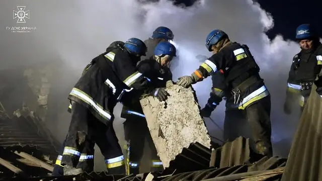 epa10322325 A handout photo released by the press service of the State Emergency Service (SES) of Ukraine on 23 November 2022 shows Ukrainian rescuers working at the site of a maternity ward of a hospital destroyed by shelling, in Vilniansk, Zaporizhzhia region, southern Ukraine. According to a statement releaed by SES, an infant died after the maternity ward of a local hospital in Vilniansk was destroyed as a result of Russian shelling. A woman and a doctor were rescued from the rubble of the building, the statement added. Russian troops entered Ukraine on 24 February 2022 starting a conflict that has provoked destruction and a humanitarian crisis. EPA/STATE EMERGENCY SERVICE OF UKRAINE HANDOUT -- BEST QUALITY AVAILABLE -- MANDATORY CREDIT: STATE EMERGENCY SERVICE OF UKRAINE -- HANDOUT EDITORIAL USE ONLY/NO SALES