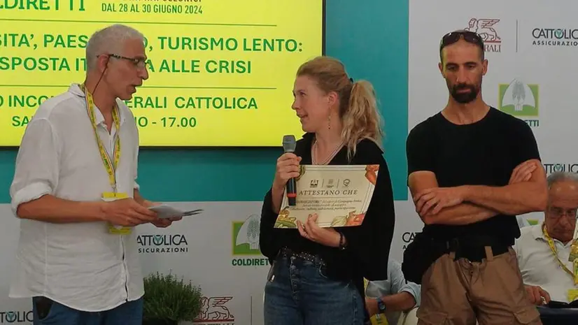 Sul palco premiati Stefania Reali e Simone Frassini - © www.giornaledibrescia.it