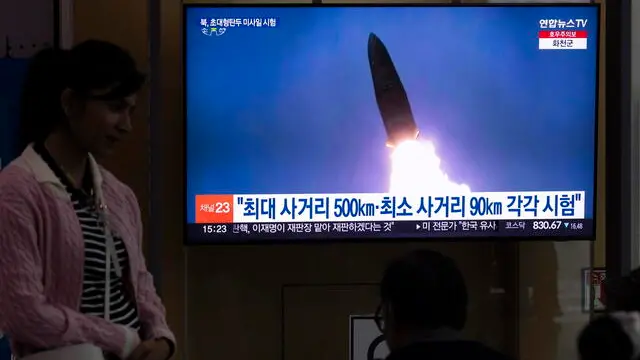 epa11451751 People watch the news at a station in Seoul, South Korea, 02 July 2024. North Korea has successfully conducted a test fire of a new-type tactical ballistic missile Hwasongpho-11Da-4.5, capable of carrying a 4.5-ton-class super-large warhead, on 01 July, according to the official North Korean Central News Agency (KCNA). EPA/JEON HEON-KYUN