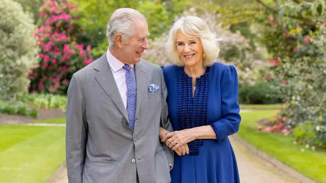 A handout photo issued by the Royal Household on April 26, 2024 shows Britain's King Charles III and Queen Camilla in the garden of Buckingham Palace in London, on April 10. British head of state King Charles III will make a limited return to public duties next week, after doctors said they were "very encouraged" by the progress of his treatment for cancer. The image, taken the day after their 19th wedding anniversary, was release to mark the first Coronation of the King. (Photo by Millie Pilkington / BUCKINGHAM PALACE / AFP) / RESTRICTED TO EDITORIAL USE - MANDATORY CREDIT "AFP PHOTO / BUCKINGHAM PALACE / Millie Pilkington " - NO MARKETING NO ADVERTISING CAMPAIGNS - DISTRIBUTED AS A SERVICE TO CLIENTS - NO SALES - NO COMMERCIAL USE INCLUDING ANY USE IN MERCHANDISING, ADVERTISING OR ANY OTHER NON-EDITORIAL USE - THIS IMAGE MUST NOT BE DIGITALLY ENHANCED, CROPPED, MANIPULATED OR MODIFIED IN ANY MANNER OR FORM. THIS PHOTO MAY SOLELY BE USED FOR EDITORIAL REPORTING PURPOSES FOR THE CONTEMPORANEOUS ILLUSTRATION OF EVENTS, THINGS OR THE PEOPLE IN THE IMAGE OR FACTS MENTIONED IN THE CAPTION. REUSE OF THE PICTURE MAY REQUIRE FURTHER PERMISSION FROM THE COPYRIGHT HOLDER. NO USE AFTER MAY 24, 2024. /