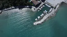 lago di Garda siccità, porto Zattara a Desenzano (bs) 24 aprile 2023 . Ansa Filippo Venezia