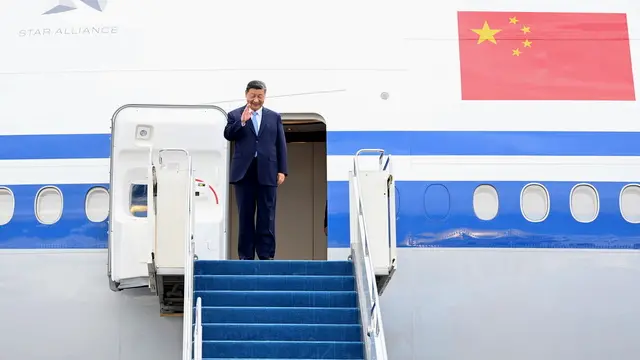epa11451855 A handout photo made available by the Kazakh President press service shows China's President Xi Jinping waving upon his arrival to the airport in Astana, Kazakhstan, 02 July 2024. China's President Xi Jinping arrived in Kazakhstan to attend the Shanghai Cooperation Organization (SCO) summit taking place in Astana from 03 to 04 July. EPA/KAZAKH PRESIDENT PRESS SERVICE HANDOUT HANDOUT EDITORIAL USE ONLY/NO SALES