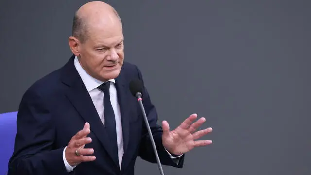 epa11454616 German Chancellor Olaf Scholz speaks during a Government question time at the German Parliament 'Bundestag' in Berlin, Germany, 03 July 2024. Chancellor Scholz attended the session of the German Parliament to answer questions of Members of Parliament. EPA/CLEMENS BILAN